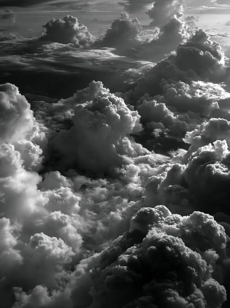 Dramatic black and white photograph of towering clouds
