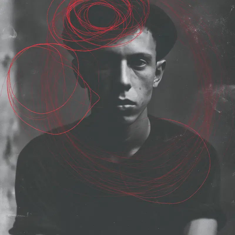 Black and white moody portrait of a man with red swirling line art