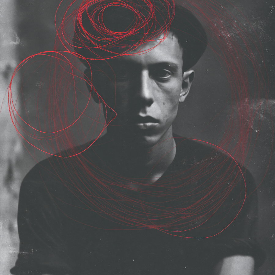 A black and white portrait of a young man wearing a hat, with red abstract circular scribbles overlayed on the image