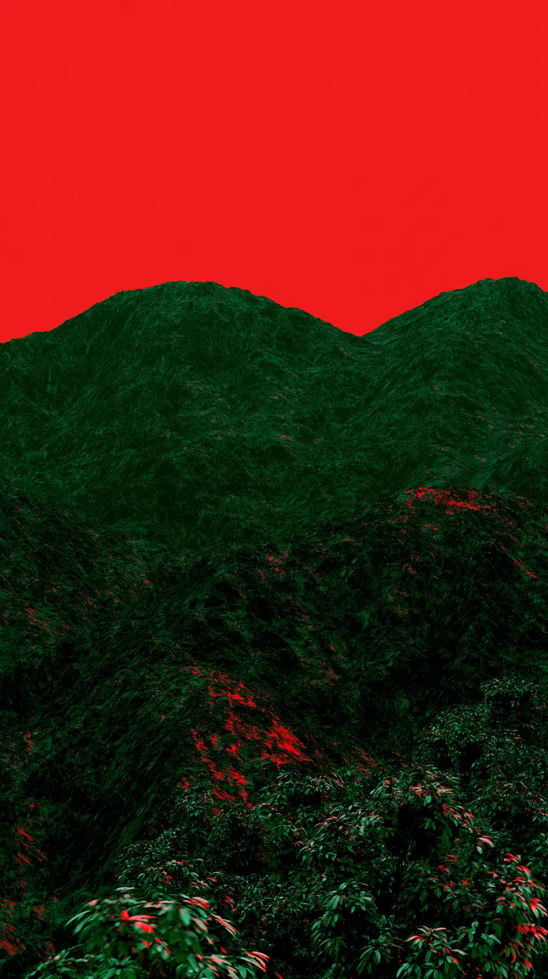 Mountain Landscape with Dark Green Foliage Against a Vivid Red Sky