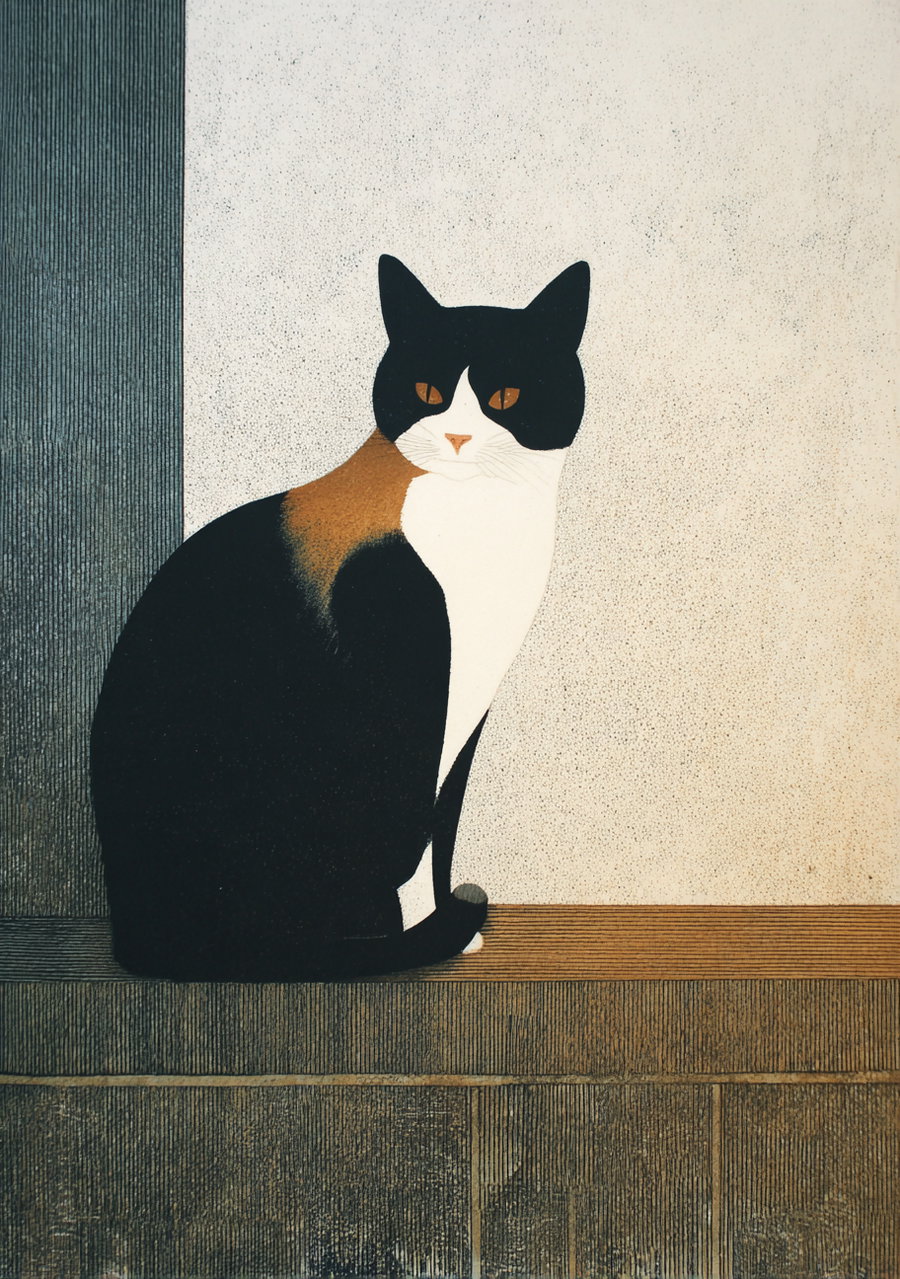 Oversized black and white cat with tan face on wall