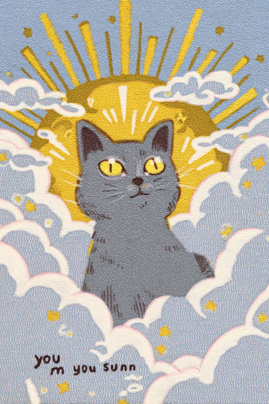 Gray cat with yellow eyes radiating golden light in clouds