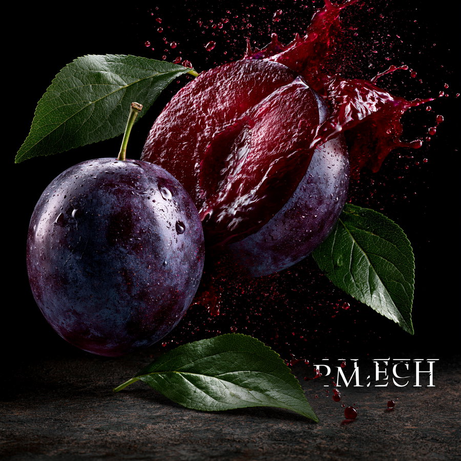 Close-up of a whole purple plum and a sliced plum with splashing juice and green leaves on a dark surface and background