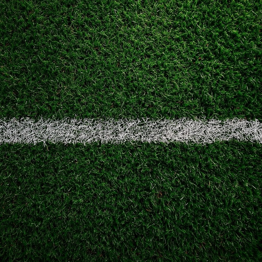Top view of vibrant green soccer grass field