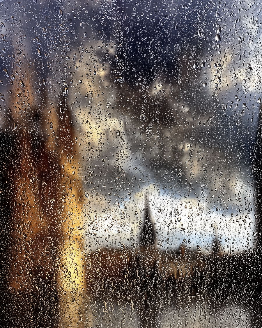 Surreal clouds resembling a cathedral with rain like bells