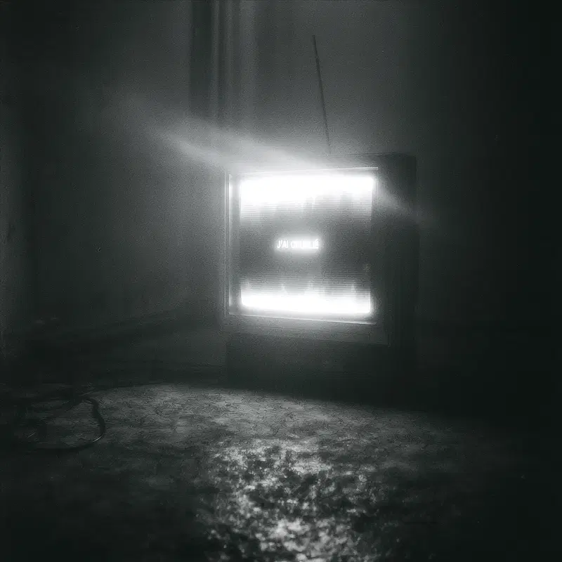Dimly Lit Vintage Television in a Gloomy Room